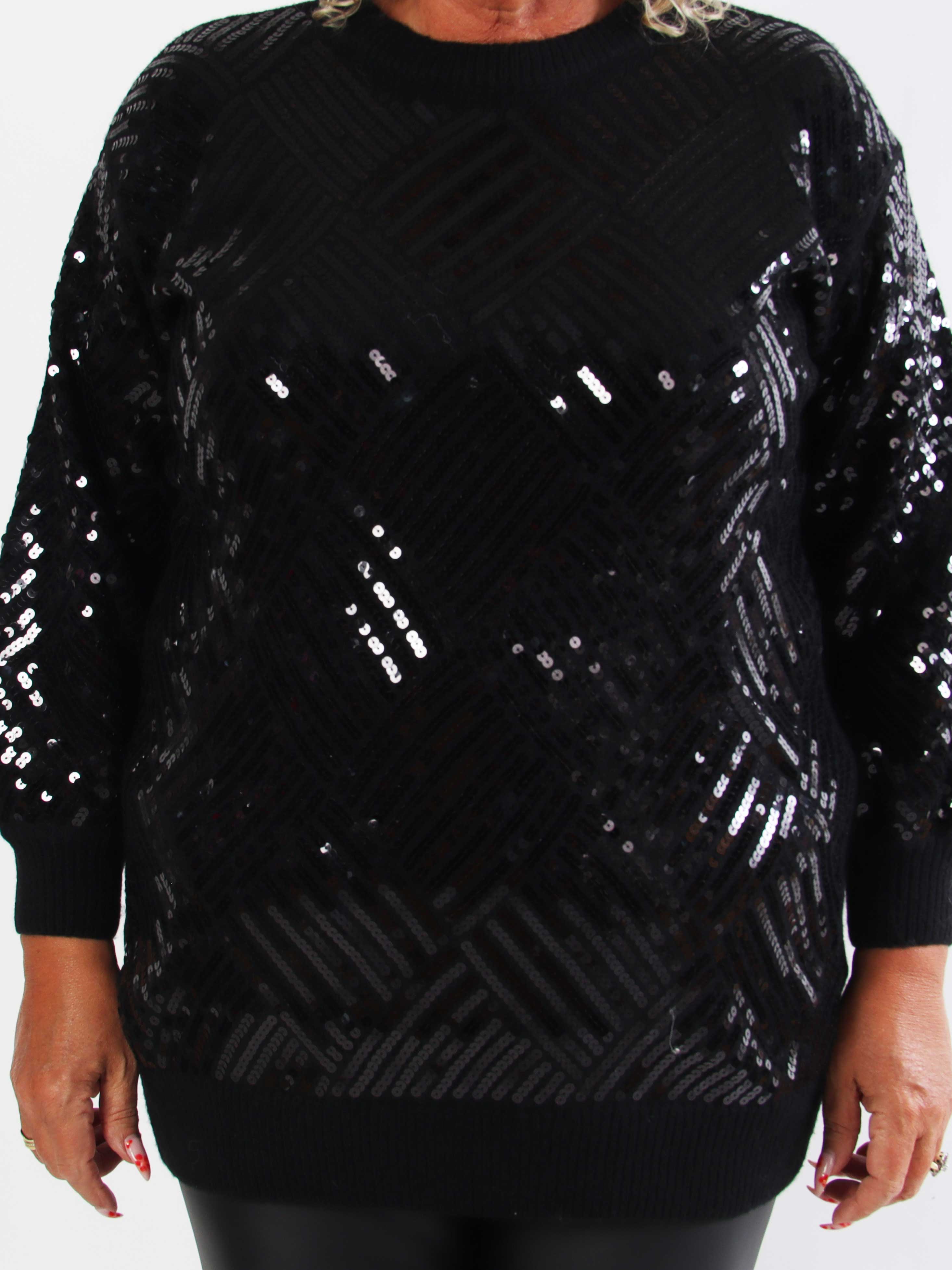 Astoria - Blød plus size strikbluse med fine pailletter på fronten